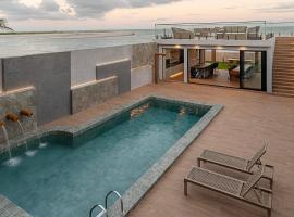 Casa de praia pé na areia, alto padrão, 07 quartos、マレシャウ・デオドーロのホテル