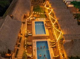 Tiki Hut Hostel, отель в городе Паломино