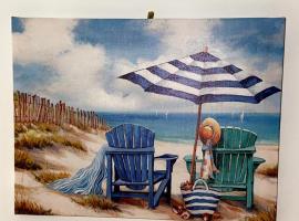 Cozy cottage, hotel de playa en Inwood