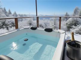 Chalet isolé avec jacuzzi et vue panoramique, cabin in Boncourt