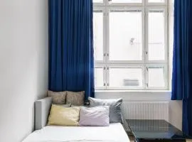 Double Sofa Bed in a Stunningly Tall Shared Studio