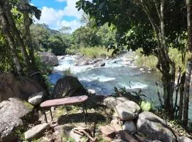 Rustic two bedroom house right by the Chirripo river
