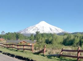 Casa de montaña con vista espectacular, hotel en Villarrica