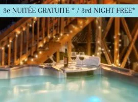 Spacious cottage in forest with spa