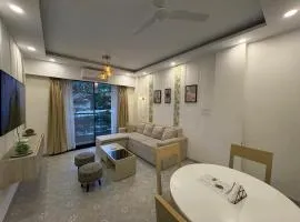 Candolim 1BHK Holiday Apartment with Pool & Smart TV - 5 Minutes to Beach