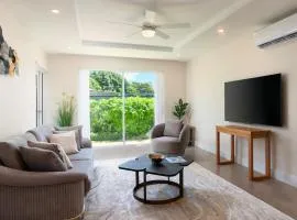 Modern 2BR Beachside Haven Ground Floor and Pool