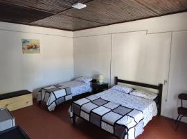 Ruma, hotel com estacionamento em Bella Uni&oacute;n