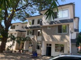 Huasheng Hotel, hôtel à Dar es Salaam