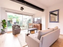 Maison avec garage et jardin