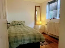 Room in studio with kitchenette and bathroom