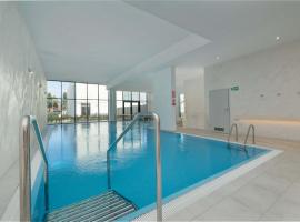 LET'S SEA 55 Apartment with Sea View, Sauna & Pool and Parking by Noclegi Renters, Hotel in Gąski
