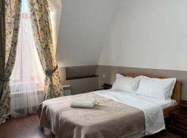 Номера в уютном отеле Sofia-Promenade, hotel v destinaci Šymkent