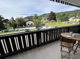 Pine-paneled room by the lake