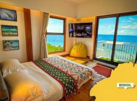 Aqua Horizon Beachside Skyline Vista Art Condominium，位于道伊斯的酒店