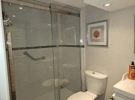 Comfortable bedroom with private bathroom and living room and TV