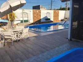Lá casa de Cristal, Casa com piscina matinhos