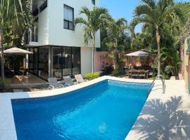 Alberca privada, asador y terraza familiar, hotel v destinaci Manzanillo