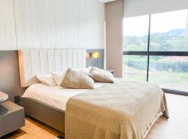 Lujo & Confort - Moderno apto con piscina y tennis, hotel in Cali