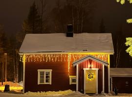 Perinteinen mökki, walking distance from centre, hotel in Kittilä