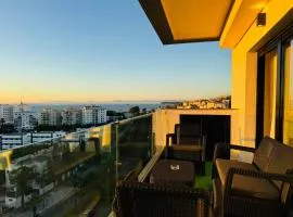 Sunlit 2-Bedroom Apartment with a Pool & Sea Views