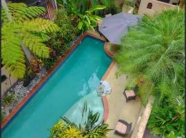 2BR Ground-Floor Gem, Walk to Everything, 2 Pools