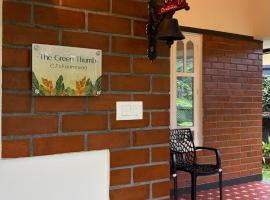 The Green Thumb Farm Stay, hotel v destinaci Mundakāyam