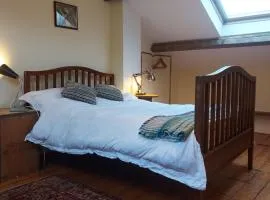 Restful attic room in riverside spot
