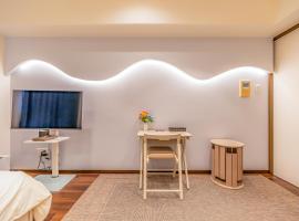 オーシャンビュー窓から見える景色を思い出に The琉球タワー10F, hotel a Yonabaru