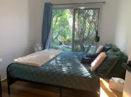 Amazing Stunning Garden View King Bedroom with shared bathroom at MC 2079