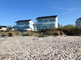 Strandhaus-Appartment-Rauchschwalbe, hotel v destinaci Fehmarnsund