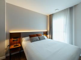 Apartamentos 2H LIVING，位于莱昂的带停车场的酒店