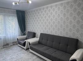 Квартира Конаев, ξενοδοχείο σε Kapchagay