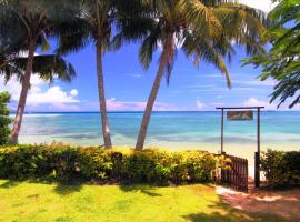 Coconut Grove Beachfront Cottages, hotel in Matei