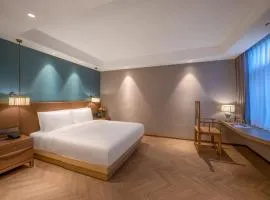 Qingdao Xinduxin Manxin Hotel