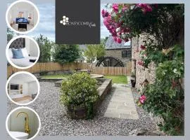 FLOUR MILL HOUSE at PITKERRO MILL, 4 double bedrooms, TVs, 3 en-suite, separate shower, wc, fully equipped kitchen, games room, large family lounge, private parking, WiFi, private garden and courtyard, long stay rates available through Honeycomb Hosts