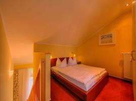 Elegant eingerichtete Ferienwohnung, מלון בGranzow