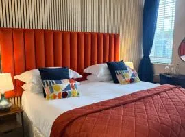 The courtyard bar, kitchen, rooms