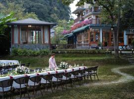 Moondance Boutique Resort, cottage à Yangshuo