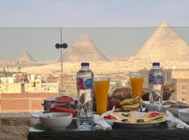 The moon pyramids view, hotel en El Cairo