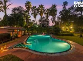 StayVista at The Birdwood Estate with Gym and Pool