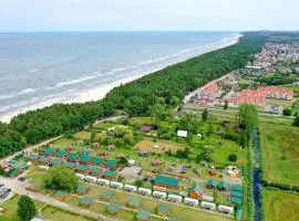 Single-story houses with terraces close to the sea