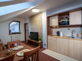 Tatragolf - Apartman s vyhladom na Tatry - Parking، فندق في فيلكا لومنيكا