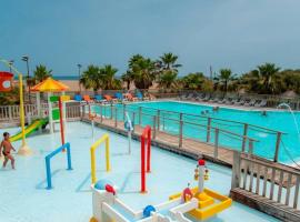 ZEcamping 4 étoiles chiens acceptés piscine chauffée et toboggans, hotel di Portiragnes