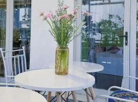 Cozy 2BR Retreat with Outdoor Living & Garden