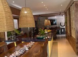 Casa nova em condominio com 4 suites spa e academia