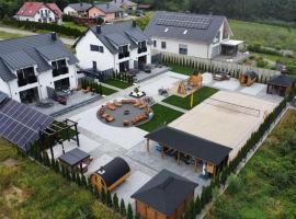 Raj nad jeziorem With Sauna Jacuzzi, hotel in Lubniewice