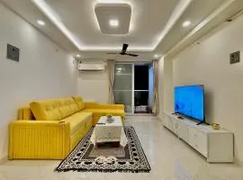 Chic 2 BHK with Balcony & Bold Yellow Lounge Powai