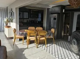 Apartamento moderno e sofisticado perto da praia
