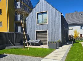Ferienhausträume - ebenerdiges Bodensee Apartment mit Garten und großer Terrasse mit Grill, Hotel in Kreuzlingen