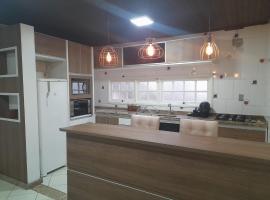 Kitnet Praia do Porto, hotel in Imbituba